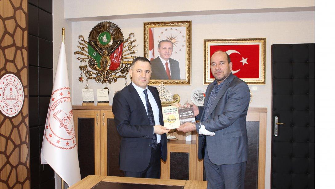 Erzurum'un değerli şair ve yazarlarından Sn.Mehmet Yaşar Genç,  Müdürlüğümüzü ziyaret ettiler.